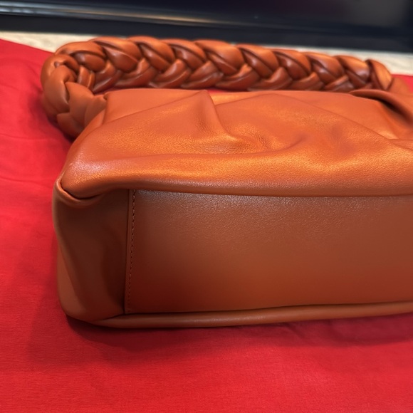 Demellier Genova Braided Leather Handbag
Terracotta Color - Picture 4 of 9